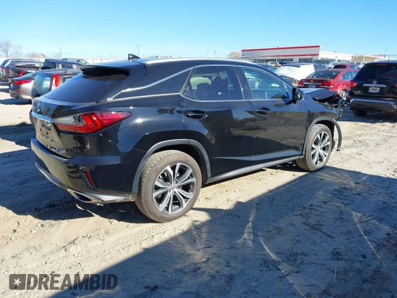 2017 Lexus RX 350 z VIN 2T2ZZMCA9HC040180, wystawiony jako IAAI lot #41679475 z przebiegiem 58 433 mil mil oraz . Historia ofert i sprzedaży dostępna na DreamBid. Obrazek 4.