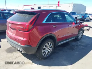 2019 Cadillac XT4 AWD Premium Luxury с VIN 1GYFZDR44KF133013, выставлен на аукционе IAAI как лот 41868561 с пробегом 96 956 миль миль и . История ставок и продаж доступна на DreamBid. Изображение 4.
