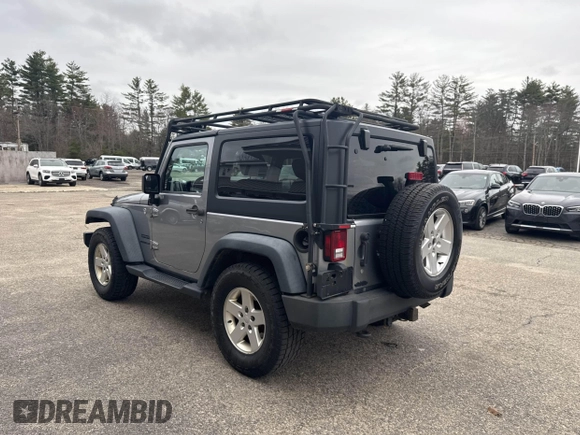 2013 Jeep Wrangler Sport with VIN 1C4AJWAG7DL605881, listed as a IAAI auction lot 41980930 with 214,662 mi miles and . Bid and sale history available at carsss.com. Image 3.