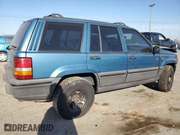 1994 Jeep Grand Cherokee Laredo with VIN 1J4FX58S1RC334178, listed as a Copart auction lot 75943554 with 165,435 mi miles and Clean Title. Bid and sale history available at carsss.com. Image 3.