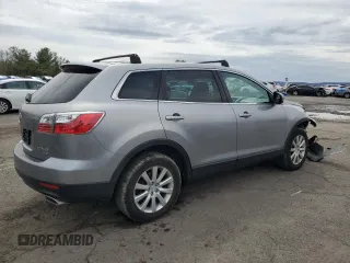 2010 Mazda CX-9 Grand Touring z VIN JM3TB3MV5A0210214, wystawiony jako Copart lot #51251585 z przebiegiem 138 885 mil mil oraz Szkoda całkowita • Salvage title. Historia ofert i sprzedaży dostępna na DreamBid. Obrazek 3.