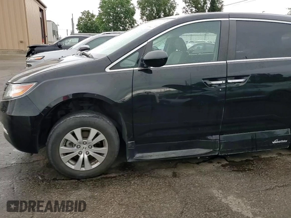 2015 Honda Odyssey EX-L z VIN 5FNRL5H64FB048406, wystawiony jako Copart lot #58044065 z przebiegiem 61 005 mil mil oraz Szkoda całkowita • Salvage title. Historia ofert i sprzedaży dostępna na DreamBid. Obrazek 14.