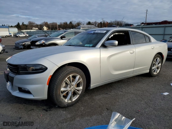 2022 Dodge Charger SXT with VIN 2C3CDXJG1NH162393, listed as a Copart auction lot 84976544 with 5,312 mi miles and Salvage Title. Bid and sale history available at carsss.com. Image 1.