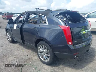2014 Cadillac SRX Performance Collection with VIN 3GYFNCE31ES599632, listed as a IAAI auction lot 42757876 with Not provided miles and . Bid and sale history available at DreamBid. Image 3.