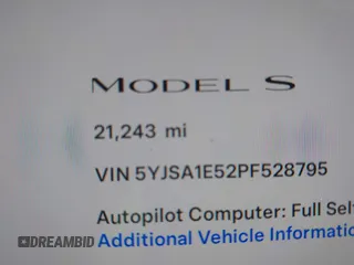 2023 Tesla Model S with VIN 5YJSA1E52PF528795, listed as a IAAI auction lot 42110660 with 21,243 mi miles and . Bid and sale history available at DreamBid. Image 15.