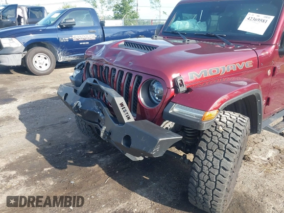 2021 Jeep Gladiator Mojave with VIN 1C6JJTEG8ML592381, listed as a IAAI auction lot 42369581 with 75,295 mi miles and . Bid and sale history available at DreamBid. Image 6.