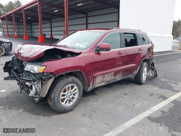2019 Jeep Grand Cherokee Laredo E with VIN 1C4RJFAG2KC814154, listed as a IAAI auction lot 38877814 with 54,119 mi miles. Bid and sale history available at carsss.com. Image 2.