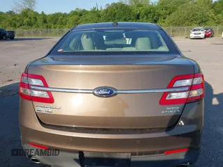 2015 Ford Taurus SEL z VIN 1FAHP2E84FG125243, wystawiony jako IAAI lot #42045847 z przebiegiem 42 093 mil mil oraz . Historia ofert i sprzedaży dostępna na DreamBid. Obrazek 16.