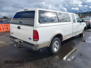 1997 Ford F-150 XL with VIN 1FTEX18L6VKC06859, listed as a IAAI auction lot 41592418 with 274,814 mi miles. Bid and sale history available at carsss.com. Image 4.