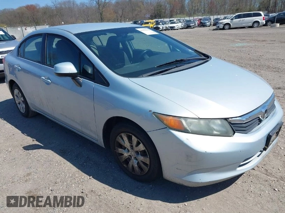 2012 Honda Civic Sdn LX with VIN 2HGFB2F53CH518723, listed as a IAAI auction lot 41995943 with 204,984 mi miles. Bid and sale history available at carsss.com. Image 1.