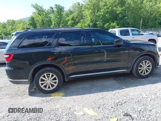 2015 Dodge Durango SXT with VIN 1C4RDJAG4FC795963, listed as a IAAI auction lot 42457196 with 161,800 mi miles and . Bid and sale history available at DreamBid. Image 13.