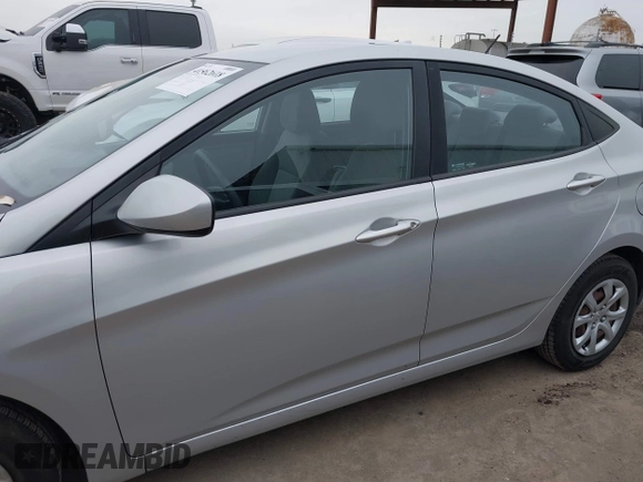 2013 Hyundai Accent GLS z VIN KMHCT4AE3DU548980, wystawiony jako IAAI lot #41562618 z przebiegiem 62 704 mil mil oraz . Historia ofert i sprzedaży dostępna na DreamBid. Obrazek 15.