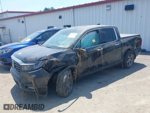 2022 Honda Ridgeline RTL-E with VIN 5FPYK3F75NB020232, listed as a IAAI auction lot 42549034 with 40,209 mi miles and . Bid and sale history available at DreamBid. Image 2.