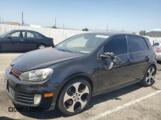2012 Volkswagen Golf GTI w/Sunroof & Navi PZEV with VIN WVWHD7AJXCW015792, listed as a Copart auction lot 61020265 with 185,765 mi miles and Salvage title. Bid and sale history available at DreamBid. Image 1.