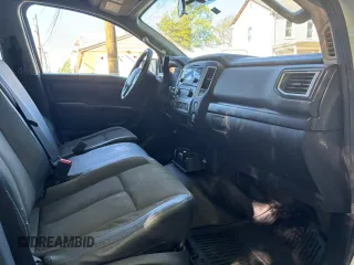 2017 Nissan Titan SV with VIN 1N6AA1EK5HN530011, listed as a Copart auction lot 57471455 with 216,992 mi miles and Clean title. Bid and sale history available at DreamBid. Image 5.