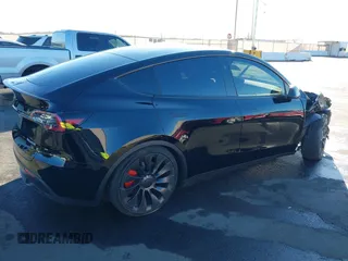 2023 Tesla Model Y Performance with VIN 7SAYGDEF6PF854797, listed as a IAAI auction lot 41319332 with 46,132 mi miles and . Bid and sale history available at DreamBid. Image 4.