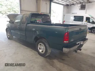 2000 Ford F-150 XL with VIN 1FTRX17L7YNA66620, listed as a IAAI auction lot 42622639 with Not provided miles and . Bid and sale history available at DreamBid. Image 3.