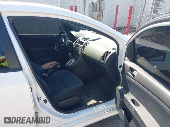 2012 Nissan Sentra SE-R z VIN 3N1BB6AP2CL670385, wystawiony jako IAAI lot #42431771 z przebiegiem 186 513 mil mil oraz . Historia ofert i sprzedaży dostępna na DreamBid. Obrazek 5.