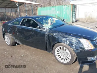 2014 Cadillac CTS Premium with VIN 1G6DH1E32E0177775, listed as a IAAI auction lot 41540366 with 106,398 mi miles and . Bid and sale history available at DreamBid. Image 6.
