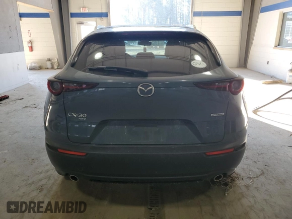 2022 Mazda CX-30 S Carbon Edition с VIN 3MVDMBCL7NM429131, выставлен на аукционе Copart как лот 42421695 с пробегом 21 825 миль миль и Списание • Salvage title. История ставок и продаж доступна на DreamBid. Изображение 6.