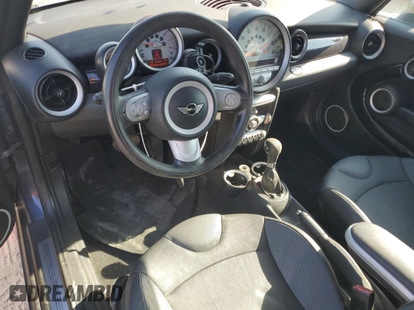 2009 MINI Convertible with VIN WMWMR33559TU96728, listed as a Copart auction lot 77949004 with 86,084 mi miles and Clean title. Bid and sale history available at DreamBid. Image 8.