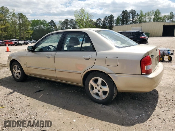 2001 Mazda Protege LX with VIN JM1BJ225810473897, listed as a Copart auction lot 52192045 with 145,839 mi miles and Salvage Title. Bid and sale history available at carsss.com. Image 2.