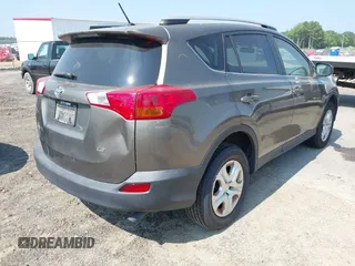 2014 Toyota RAV4 LE with VIN JTMZFREVXED034316, listed as a IAAI auction lot 42610135 with 214,871 mi miles and . Bid and sale history available at DreamBid. Image 4.