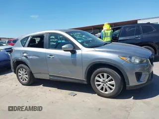 2014 Mazda CX-5 Sport with VIN JM3KE2BE7E0371203, listed as a IAAI auction lot 42243756 with 121,534 mi miles and . Bid and sale history available at DreamBid. Image 14.