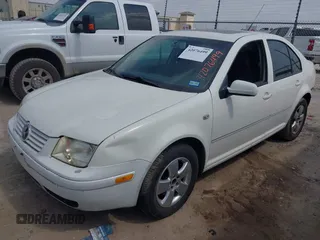 2004 Volkswagen Jetta Sedan GLS with VIN 3VWSK69M94M050424, listed as a IAAI auction lot 42076499 with 163,597 mi miles. Bid and sale history available at carsss.com. Image 2.