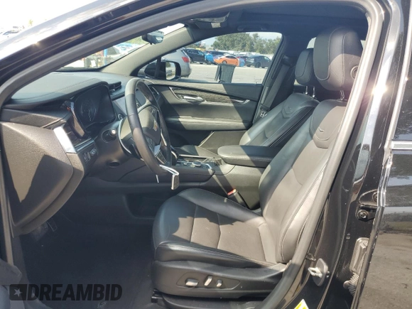 2022 Cadillac XT5 FWD Premium Luxury z VIN 1GYKNCRS7NZ101131, wystawiony jako Copart lot #56365065 z przebiegiem 74 168 mil mil oraz Szkoda całkowita • Salvage title. Historia ofert i sprzedaży dostępna na DreamBid. Obrazek 7.
