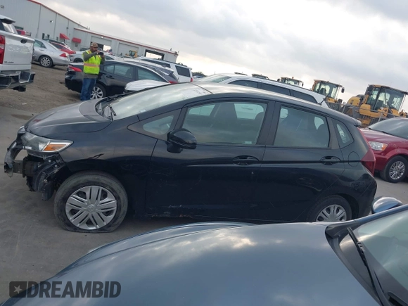 2020 Honda Fit LX z VIN 3HGGK5H40LM717305, wystawiony jako IAAI lot #42093169 z przebiegiem 69 665 mil mil oraz . Historia ofert i sprzedaży dostępna na DreamBid. Obrazek 14.