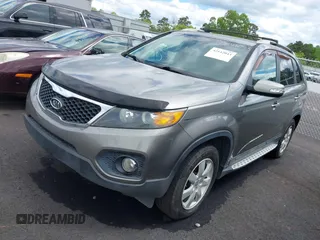 2012 Kia Sorento LX with VIN 5XYKT3A60CG285902, listed as a IAAI auction lot 42142043 with 225,206 mi miles and . Bid and sale history available at carsss.com. Image 2.