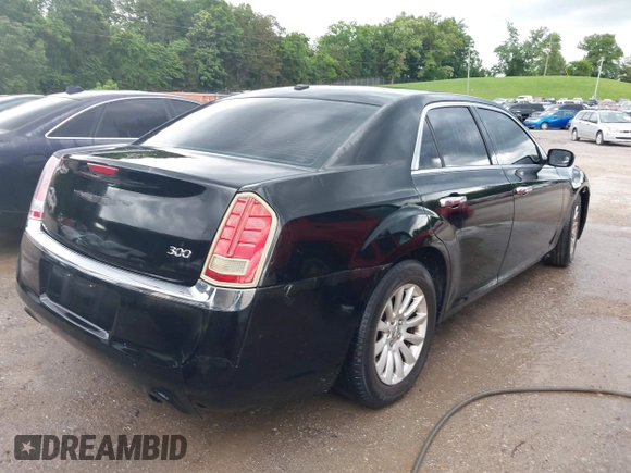 2013 Chrysler 300 with VIN 2C3CCAAG4DH557991, listed as a IAAI auction lot 42398680 with 178,150 mi miles and . Bid and sale history available at DreamBid. Image 4.