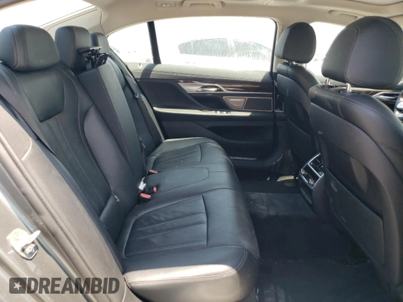 2019 BMW 7 Series 740i z VIN WBA7E2C56KB454602, wystawiony jako Copart lot #56591244 z przebiegiem Nie podano mil oraz Czysty tytuł • Clean title. Historia ofert i sprzedaży dostępna na DreamBid. Obrazek 10.