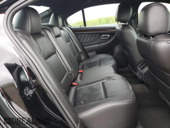 2016 Ford Taurus Limited with VIN 1FAHP2F81GG113129, listed as a Copart auction lot 55770045 with 104,778 mi miles and Salvage title. Bid and sale history available at DreamBid. Image 10.