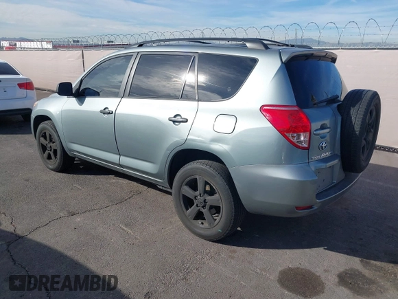 2008 Toyota RAV4 with VIN JTMBK33V886036474, listed as a IAAI auction lot 41615693 with 214,589 mi miles. Bid and sale history available at carsss.com. Image 3.