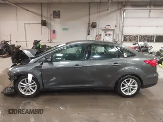 2016 Ford Focus SE with VIN 1FADP3F21GL247906, listed as a IAAI auction lot 42043546 with 124,532 mi miles and . Bid and sale history available at DreamBid. Image 14.
