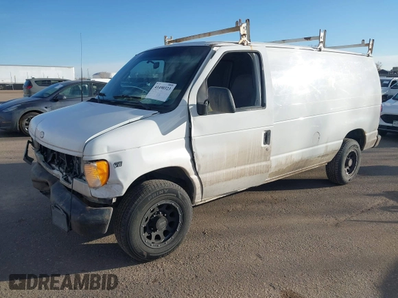 2001 Ford Econoline Cargo Commercial with VIN 1FTNE24L21HA95140, listed as a IAAI auction lot 41490323 with 330,136 mi miles and . Bid and sale history available at carsss.com. Image 2.