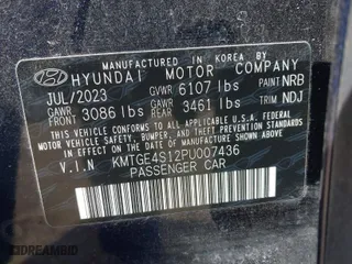 2023 Genesis Electrified G80 with VIN KMTGE4S12PU007436, listed as a IAAI auction lot 41876963 with NaN miles. Bid and sale history available at carsss.com. Image 9.