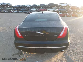 2018 Jaguar XJ with VIN SAJWJ2GD3J8W15092, listed as a IAAI auction lot 41844106 with 56,357 mi miles. Bid and sale history available at carsss.com. Image 16.