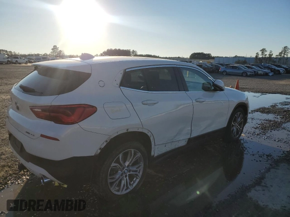 2018 BMW X2 sDrive28i with VIN WBXYJ3C3XJEJ81736, listed as a Copart auction lot 87390404 with 165,522 mi miles and Salvage Title. Bid and sale history available at carsss.com. Image 3.