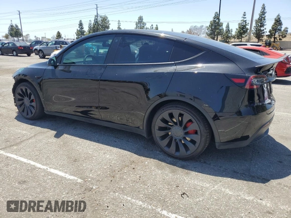 2022 Tesla Model Y Performance z VIN 7SAYGDEF2NF443037, wystawiony jako Copart lot #56870145 z przebiegiem 51 897 mil mil oraz Szkoda całkowita • Salvage title. Historia ofert i sprzedaży dostępna na DreamBid. Obrazek 2.