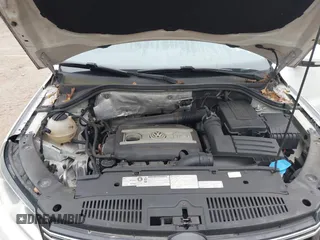2012 Volkswagen Tiguan with VIN WVGCV7AX5CW508206, listed as a IAAI auction lot 41612007 with 116,455 mi miles and . Bid and sale history available at DreamBid. Image 10.