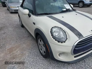 2016 MINI Convertible z VIN WMWWG5C51G3C19178, wystawiony jako IAAI lot #41909039 z przebiegiem 87 533 mil mil oraz . Historia ofert i sprzedaży dostępna na DreamBid. Obrazek 17.