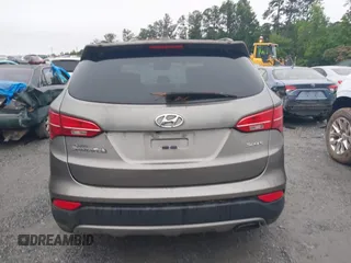 2015 Hyundai Santa Fe z VIN 5XYZU3LB4FG264397, wystawiony jako IAAI lot #42362877 z przebiegiem 177 252 mil mil oraz . Historia ofert i sprzedaży dostępna na DreamBid. Obrazek 16.