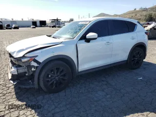 2021 Mazda CX-5 Sport with VIN JM3KFABM4M1321480, listed as a Copart auction lot 46187805 with 66,382 mi miles and Salvage Title. Bid and sale history available at carsss.com. Image 1.