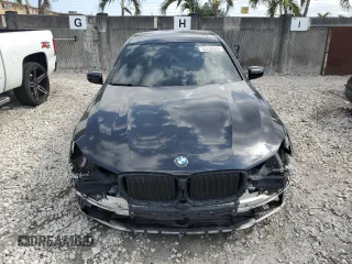 2017 BMW 7 Series 740i with VIN WBA7E2C34HG741026, listed as a Copart auction lot 52792995 with 91,462 mi miles and Salvage Title. Bid and sale history available at carsss.com. Image 5.