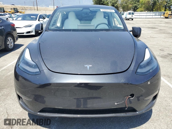 2024 Tesla Model Y z VIN 7SAYGDED7RF056570, wystawiony jako Copart lot #55097125 z przebiegiem 17 019 mil mil oraz Szkoda całkowita • Salvage title. Historia ofert i sprzedaży dostępna na DreamBid. Obrazek 5.