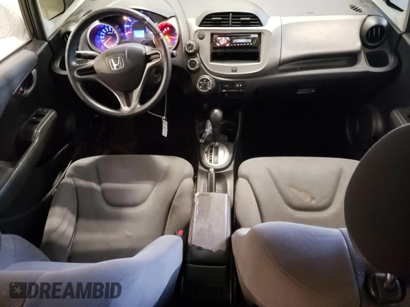 2009 Honda Fit with VIN JHMGE88259S053426, listed as a Copart auction lot 87894815 with 143,665 mi miles and Salvage Title. Bid and sale history available at carsss.com. Image 8.