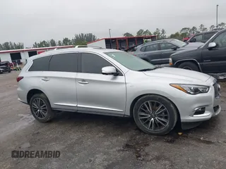 2019 Infiniti QX60 Pure z VIN 5N1DL0MM9KC534133, wystawiony jako IAAI lot #41407744 z przebiegiem 215 402 mil mil oraz . Historia ofert i sprzedaży dostępna na DreamBid. Obrazek 14.